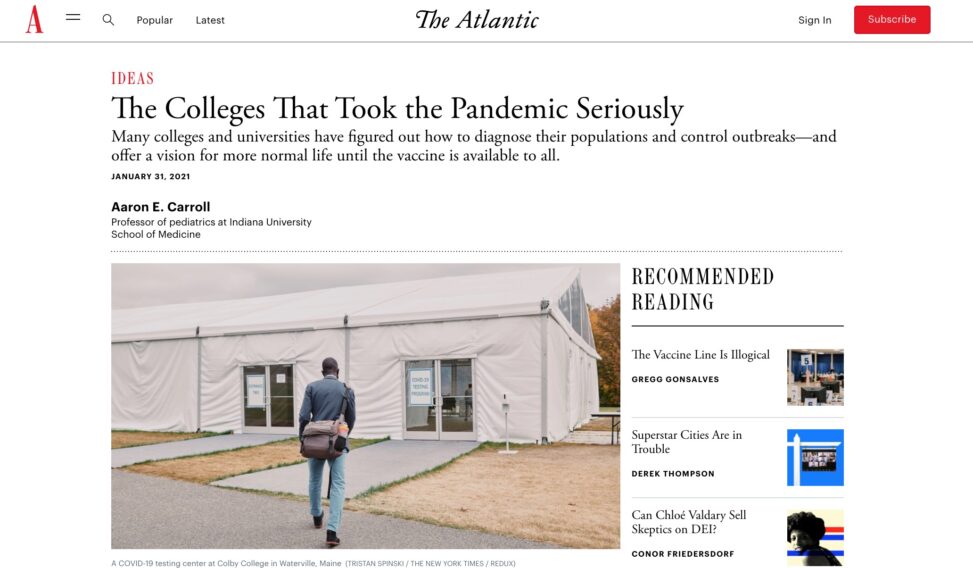 Cover of article in Ideas section titled The Colleges That Took the Pandemic Seriously below text is Many colleges and universities have figured out how to diagnose their populations and control outbreaks—and offer a vision for more normal life until the vaccine is available to all. plus photo of a student walking towards a campus tent structure